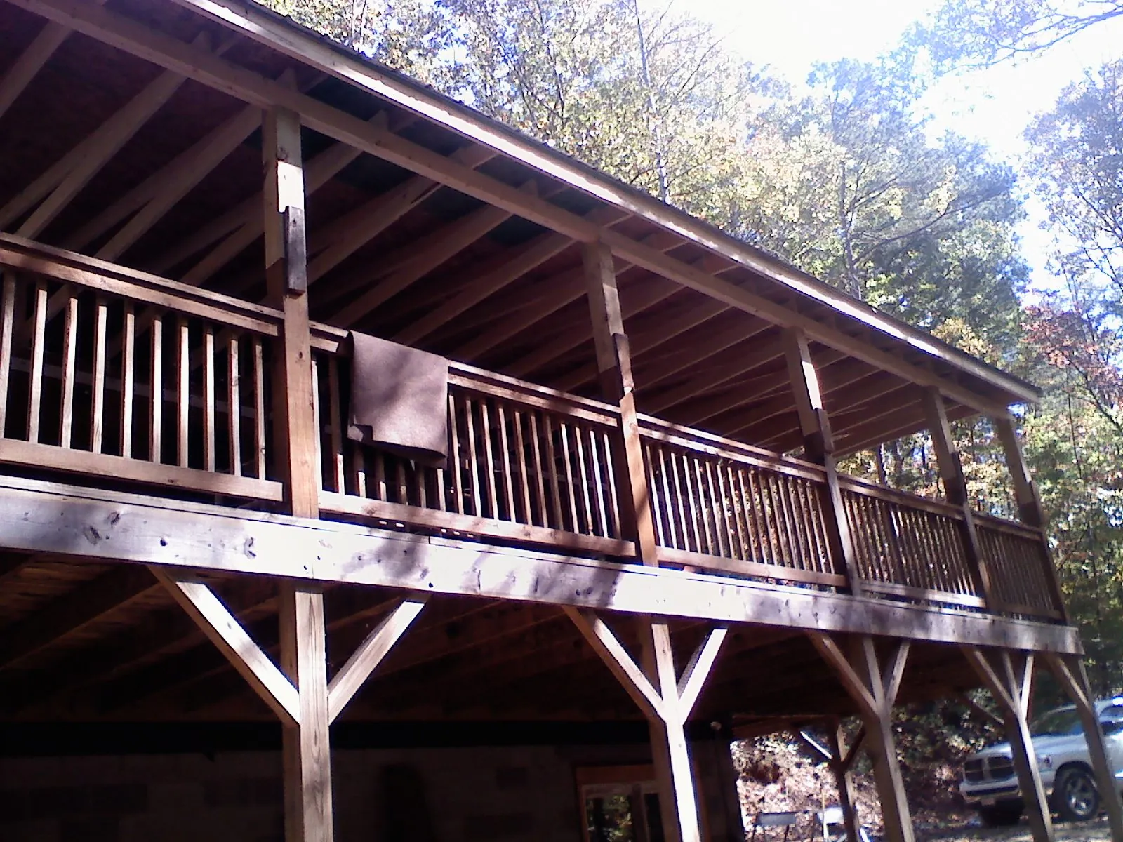 Timber framing under a new elevated porch and deck — Roof Leak Repair in Fredonia by Roofing Brothers